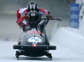 Cynthia Appiah et Dawn Richardson Wilson du Canada concourent dans le bobsleigh à deux femmes lors de la Coupe du monde BMW IBSF Bob & Skeleton 2021/22 à Veltins Eis-Arena à Winterberg, en Allemagne, le 12 décembre 2021.