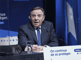 Le premier ministre du Québec, François Legault, photographié lors d'une séance d'information mardi.  Cette semaine, le Québec est devenu l'une des premières juridictions au monde à poursuivre une politique de vaccination obligatoire contre la COVID-19.