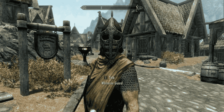 Skyrim Player capture une vraie flèche dans le moment du genou
