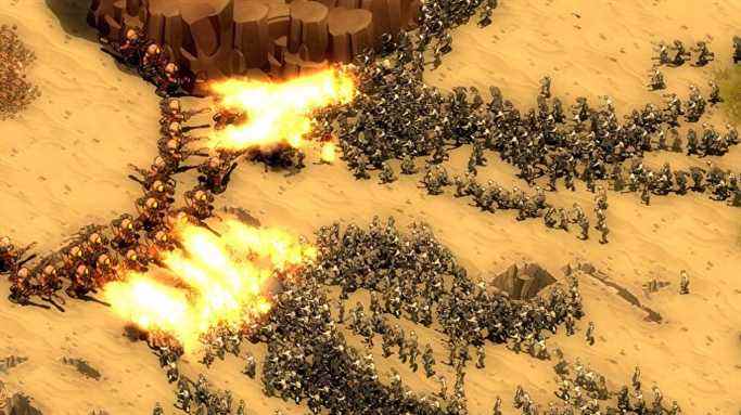 Une énorme horde de zombies attaquant une ligne défensive de soldats lance-flammes dans They Are Billions