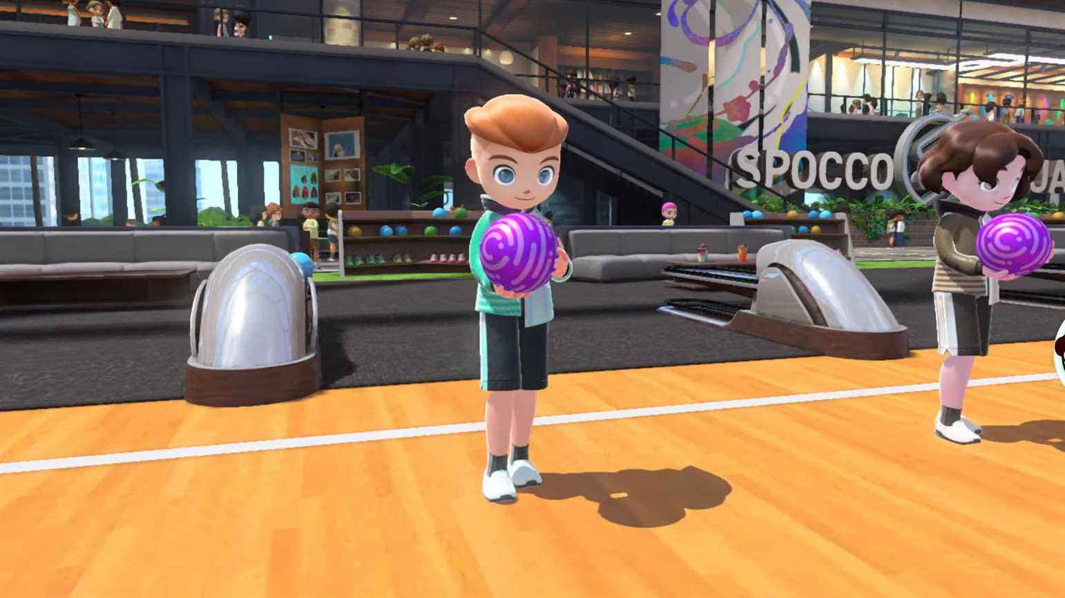 Un homme qui joue au bowling dans Nintendo Switch Sports