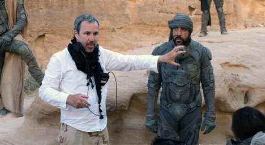 DUNE, from left: director Denis Villeneuve, Javier Bardem, on-set, 2020. ph: Chiabella James / © Warner Bros. / Courtesy Everett Collection