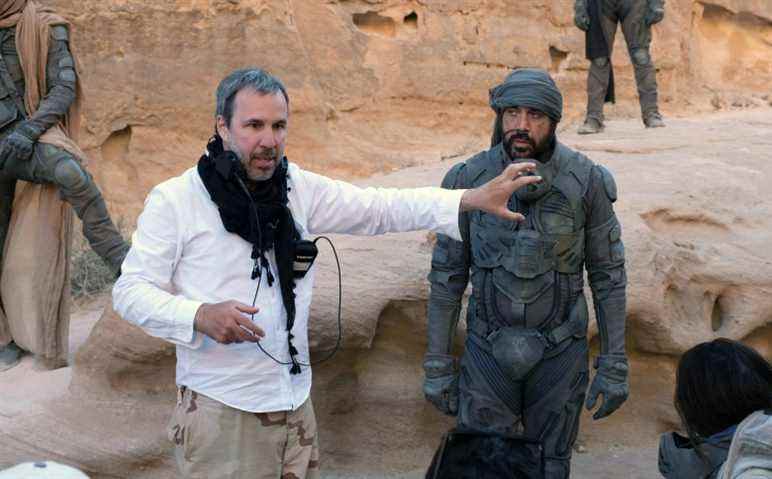 DUNE, from left: director Denis Villeneuve, Javier Bardem, on-set, 2020. ph: Chiabella James / © Warner Bros. / Courtesy Everett Collection