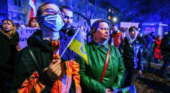 A member of Ukrainian community seen with a flag during the demonstration. Following the beginning of the Russian invasion of Ukraine, members of the Ukrainian community and supportive Poles and Belarusians protested near diplomatic missions of the Russian Federation to express their opposition to Russian military aggression. In Krakow, where Ukrainian immigration is particularly numerous, several thousand people gathered in front of the Russian consulate. (Photo by Filip Radwanski / SOPA Images/Sipa USA)(Sipa via AP Images)