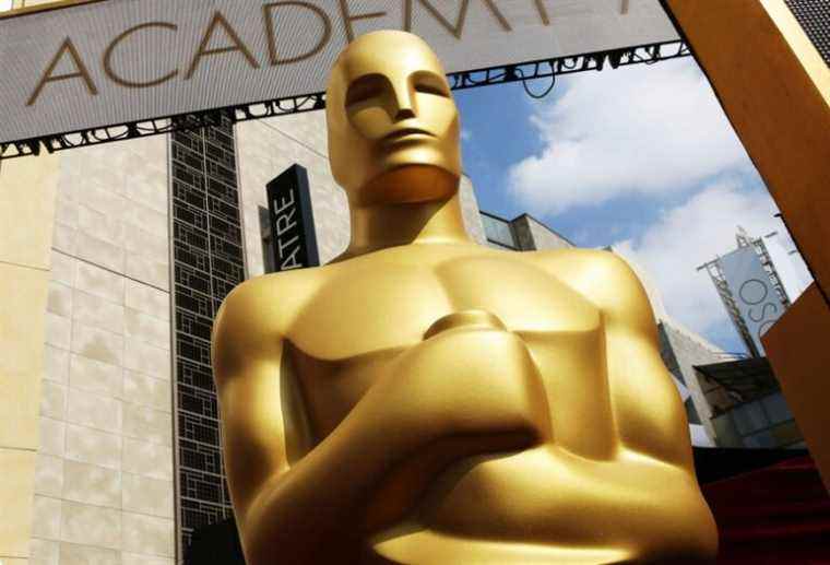 FILE - In this Feb. 21, 2015 file photo, an Oscar statue appears outside the Dolby Theatre for the 87th Academy Awards in Los Angeles. (Photo by Matt Sayles/Invision/AP, File)