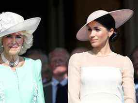 Camilla, duchesse de Cornouailles et Meghan, duchesse de Sussex assistent à la célébration du 70e anniversaire du prince de Galles qui s'est tenue au palais de Buckingham le 22 mai 2018 à Londres, en Angleterre.  (Photo de Chris Jackson/Getty Images)