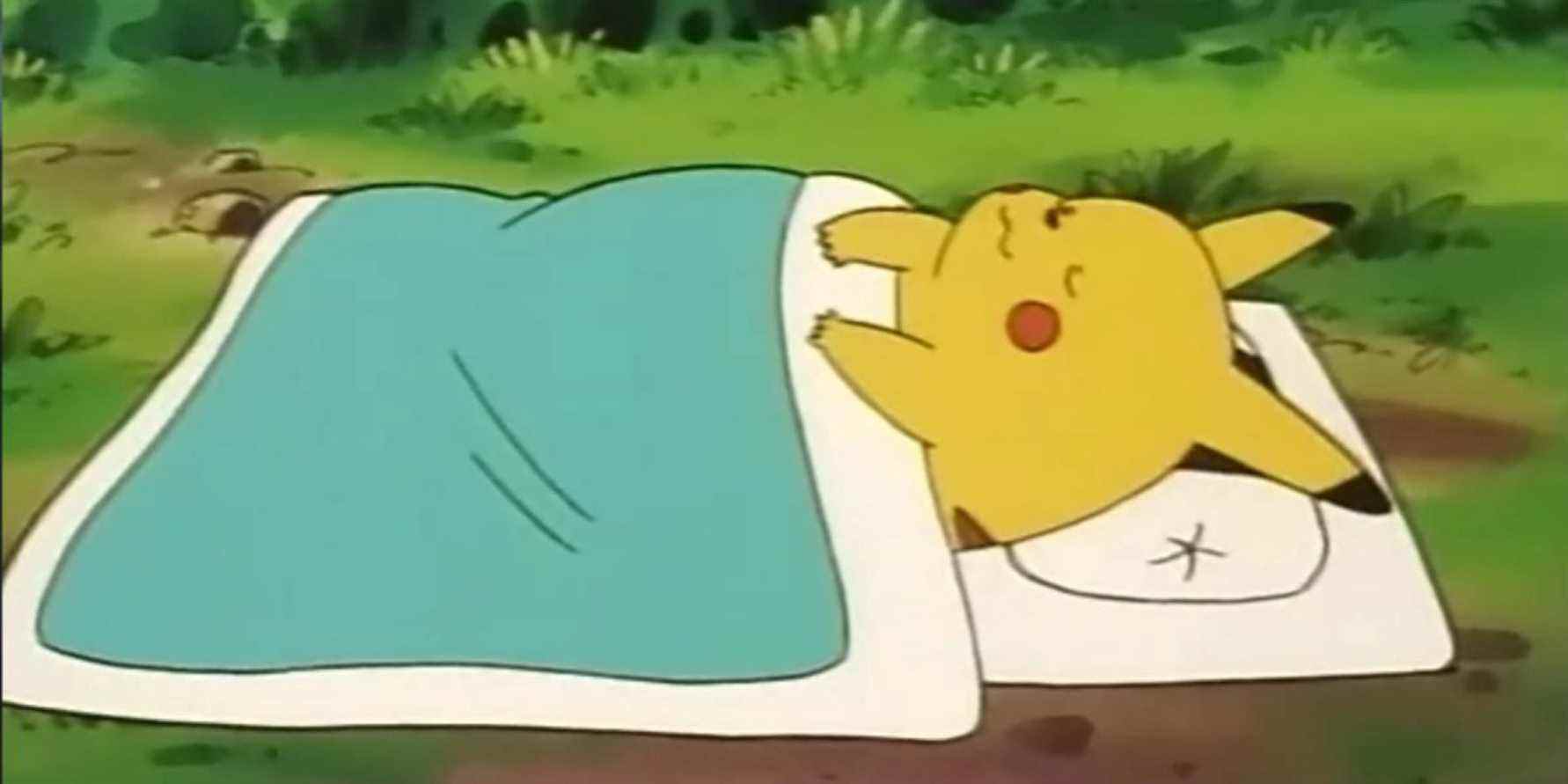 Pikachu sleeping under a blanket in the Pokemon anime