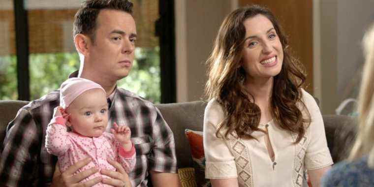 Colin Hanks as Greg and Zoe Lister-Jones as Jen holding a baby in Life In Pieces