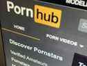 Le site Web Pornhub est affiché sur un écran d'ordinateur à Toronto le mercredi 16 décembre 2020. 