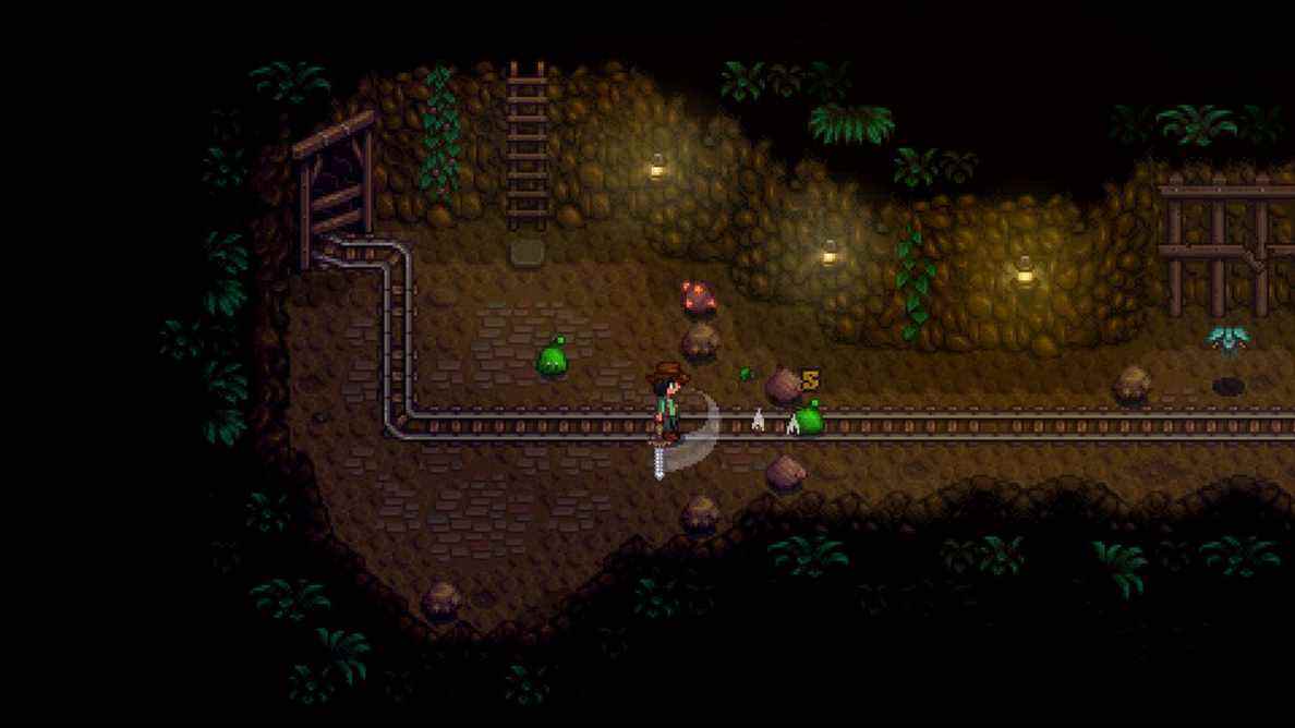 un personnage dans stardew se balance sur un slime