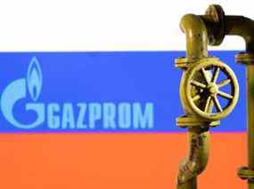 L'illustration montre le logo Gazprom et le drapeau russe