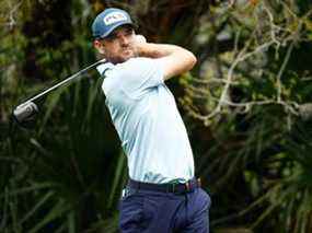 Corey Conners du Canada joue son tir du cinquième tee lors de la première ronde du championnat THE PLAYERS sur le Stadium Course au TPC Sawgrass jeudi.