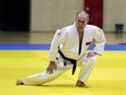 Le président russe Vladimir Poutine assiste à une séance d'entraînement de judo au complexe sportif et d'entraînement Yug-Sport dans la station balnéaire de la mer Noire à Sotchi, en Russie, le 14 février 2019.