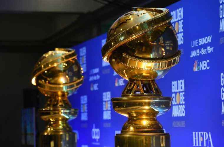 FILE - This Dec. 9, 2019 file photo shows replicas of Golden Globe statues at the nominations for the 77th annual Golden Globe Awards  in Beverly Hills, Calif. The 77th annual Golden Globe Awards will be held on Sunday, Jan. 5. (AP Photo/Chris Pizzello, File)