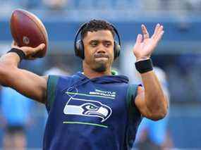 Russell Wilson s'échauffe avant un match de pré-saison l'an dernier.