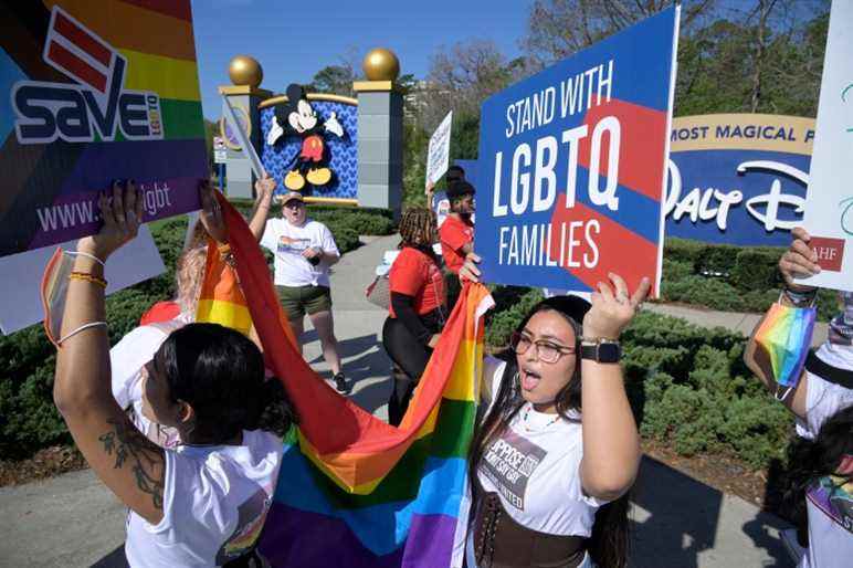 IMAGE DISTRIBUTED FOR AIDS HEALTHCARE FOUNDATION - Advocates march at a rally at the Walt Disney Company in Orlando, Fla., spearheaded by advocates from AIDS Healthcare Foundation (AHF) on Thursday, March 3, 2022, in Orlando, Fla. The advocates targeted Disney in two near-simultaneous rallies in Orlando and Burbank, Calif., to urge Disney to publicly speak out to oppose Florida's hateful, homophobic "Don't Say Gay" bill targeting LGBTQ+youth, their families, teachers and school counselors that is currently pending in the Florida legislature. (Phelan M. Ebenhack/AP Images for AIDS Healthcare Foundation)