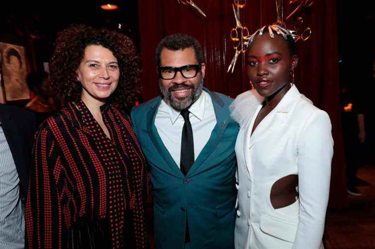 Universal's Donna Langley poses with Director/Writer/Producer Jordan Peele and Lupita Nyong'o at the after party as Universal Pictures presents "US", the opening night film at the SXSW Film Festival on Friday, March 8th, 2019 in Austin, Texas. (photo: Alex J. Berliner/ABImages) via AP Images