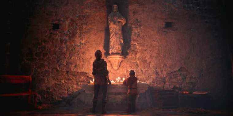 A Plague Tale Innocence Amicia and Hugo standing in a church