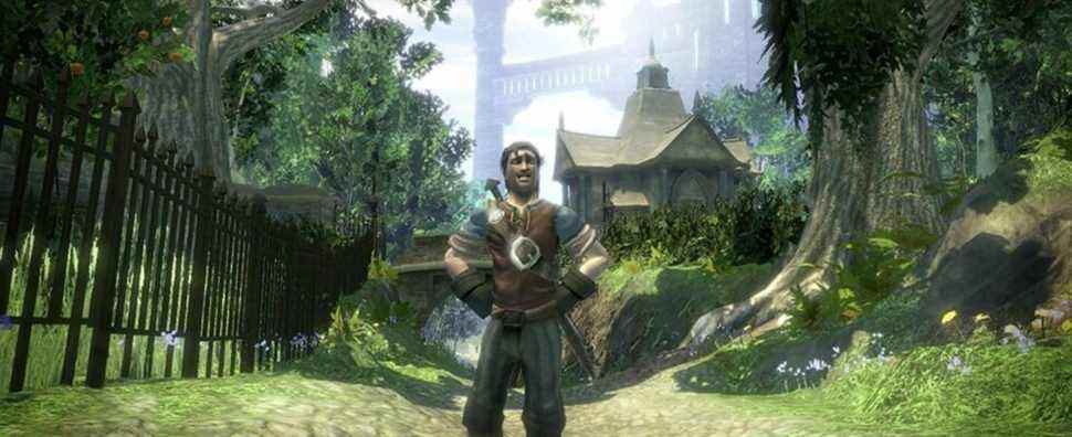 A Fable 2 protagonist standing on a paved woodland road with a city in the background