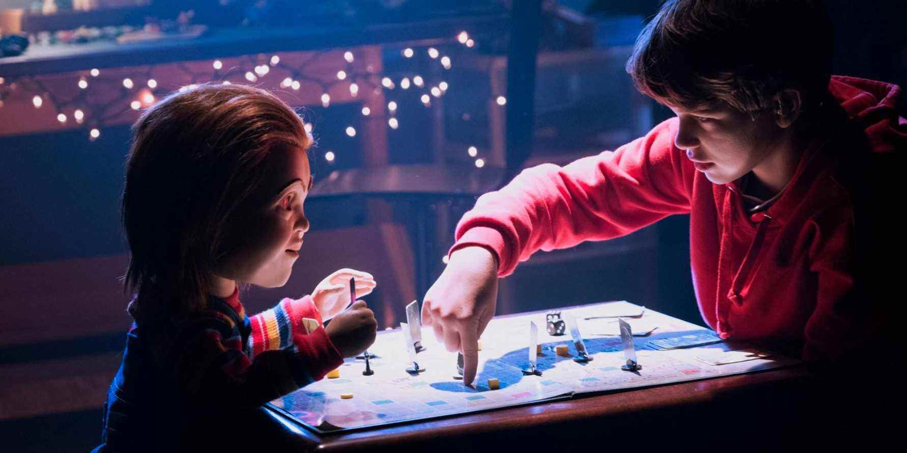 Chucky the doll playing a game with Andy Barclay (Gabriel Bateman) in Child's Play (2019)