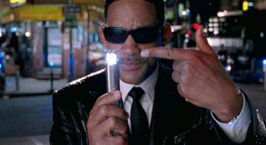 Will Smith points to the mind eraser in Men in Black