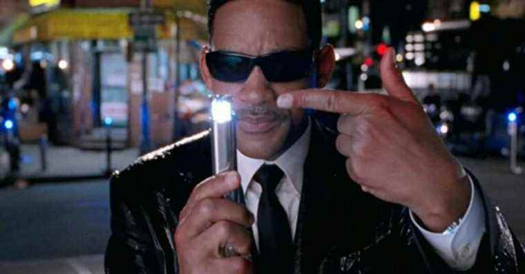 Will Smith points to the mind eraser in Men in Black