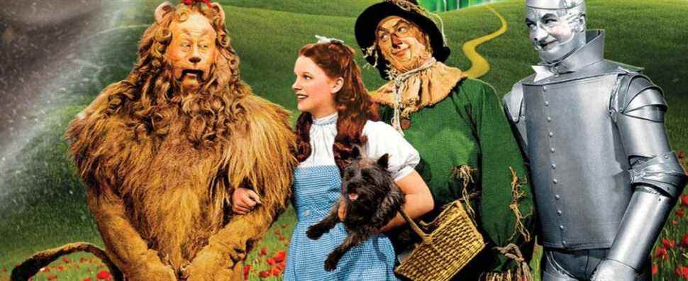 The cast of The Wizard of Oz on the yellow brick road