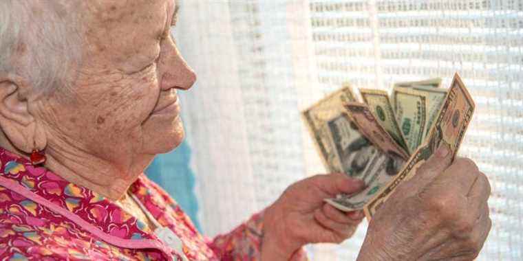 old woman with money