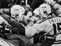 Ryan Walter, de gauche à droite, Guy Lafleur, Gilbert Delorme et Bobby Smith célèbrent un but de Lafleur le 19 novembre 1983.   