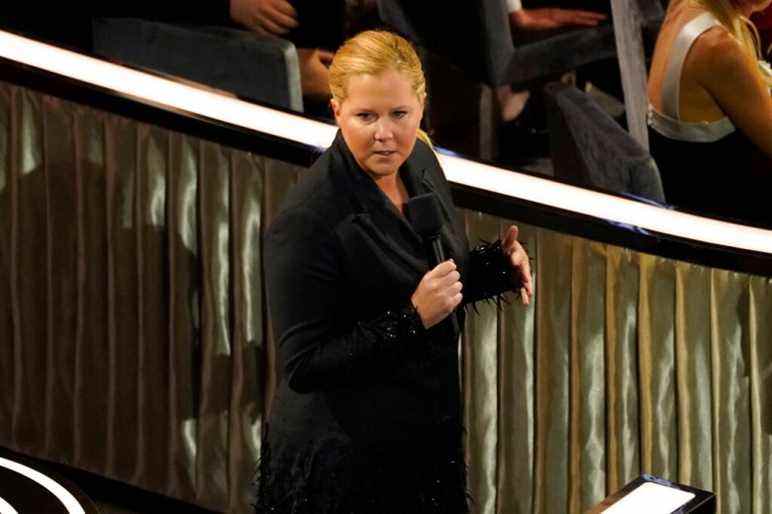 Host Amy Schumer speaks in the audience at the Oscars on Sunday, March 27, 2022, at the Dolby Theatre in Los Angeles. (AP Photo/Chris Pizzello)