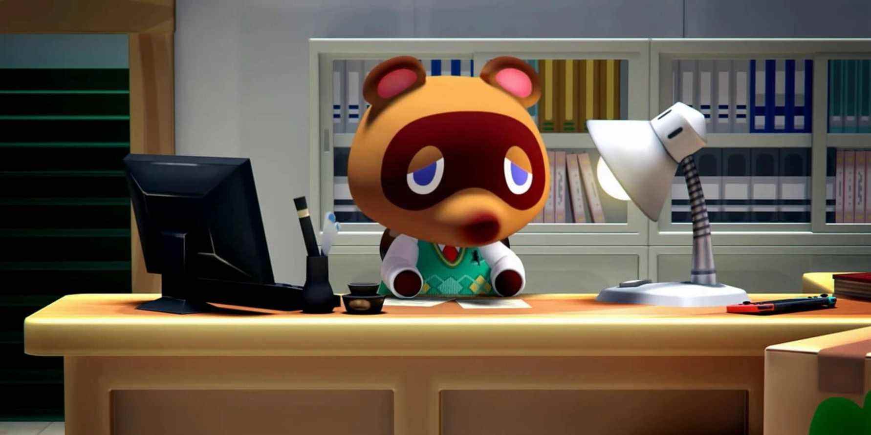 animal crossing new horizons tom nook on desk