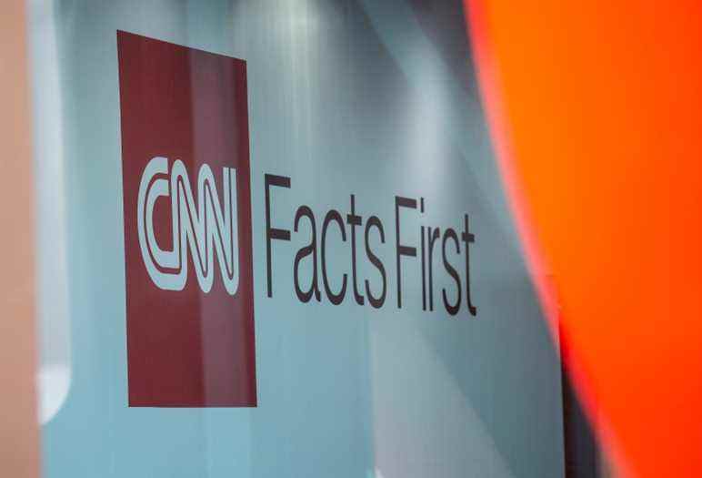 A CNN sign is displayed in the front lobby of the CNN Center in Atlanta on Wednesday, Feb. 2, 2022. CNN President Jeff Zucker has abruptly resigned Wednesday after acknowledging a consensual relationship with another network executive. (AP Photo/Ron Harris)