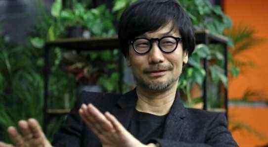 Photo of Hideo Kojima with plants in the background.