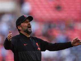 Dans cette photo d'archive prise le 16 avril 2022, le manager allemand de Liverpool, Jurgen Klopp, célèbre à la fin du match de football de demi-finale de la FA Cup anglaise entre Liverpool et Manchester City au stade de Wembley, dans le nord-ouest de Londres.