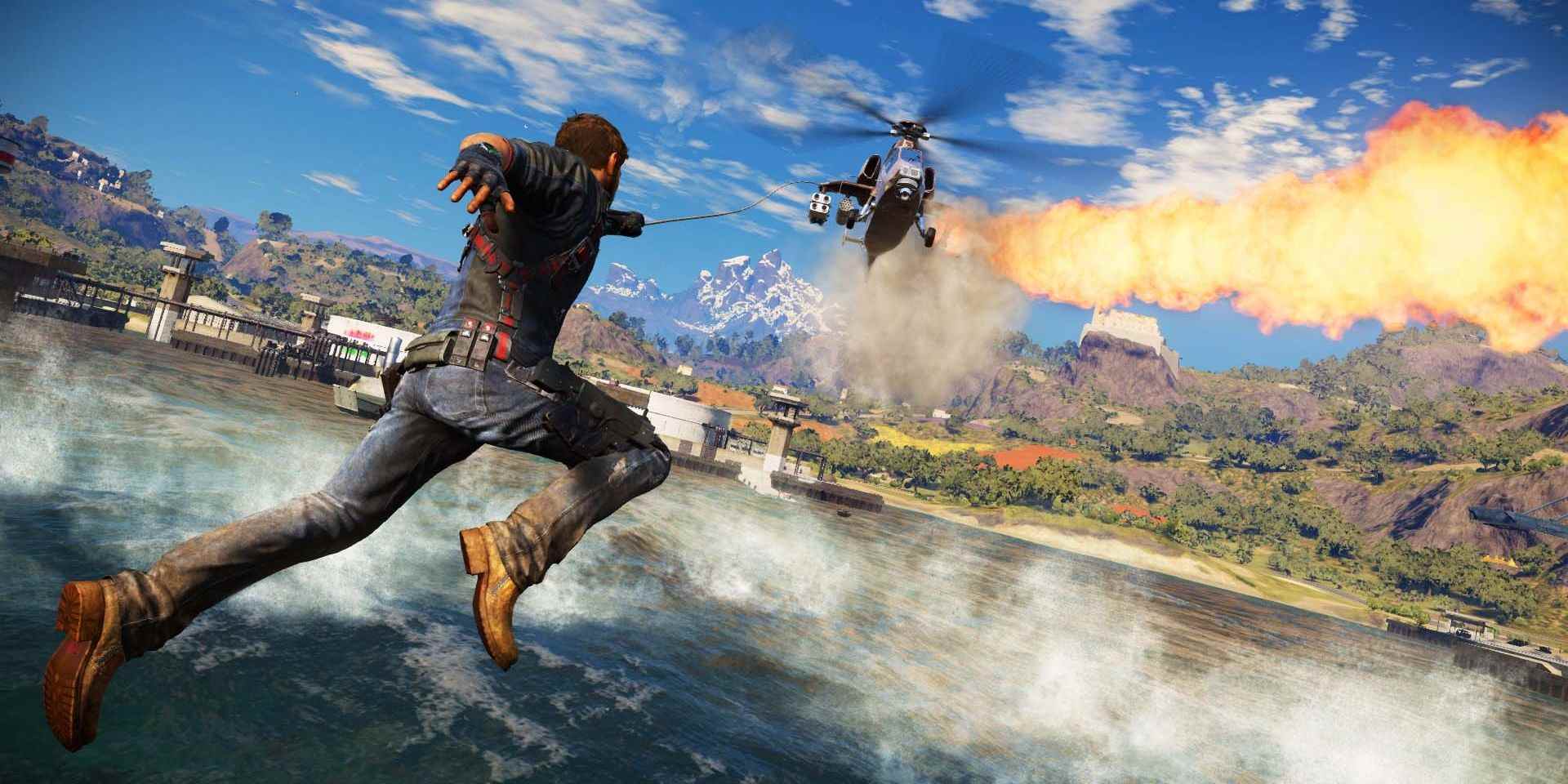 Rico Rodriguez s'attaque à un hélicoptère en feu dans Just Cause 3 à Medici.