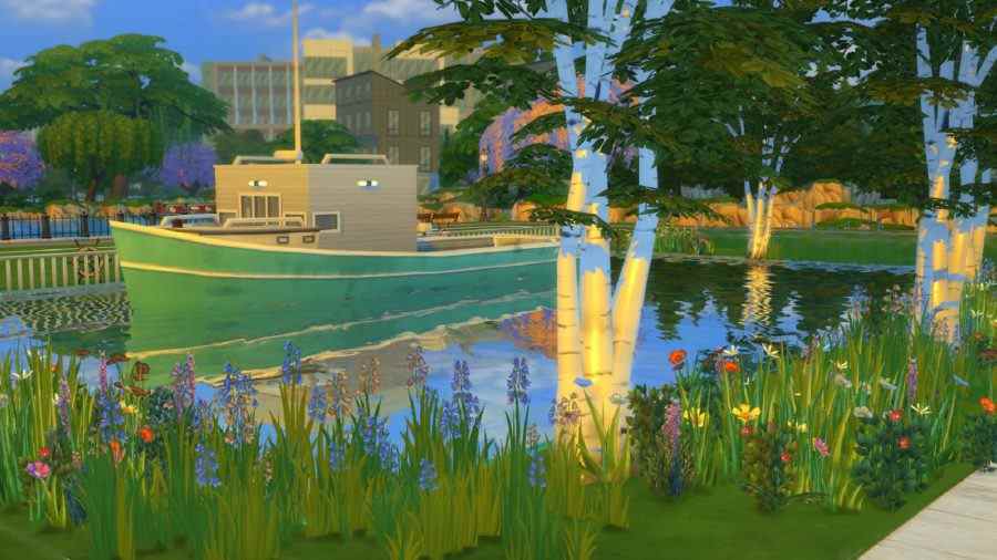 Une péniche sur l'eau des sims 4 mod House Boat