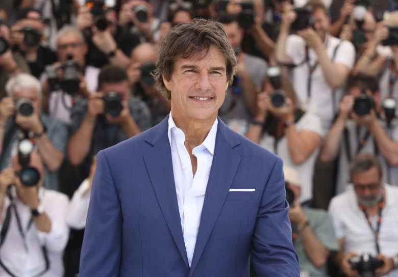 Tom Cruise poses for photographers at the photo call for the film 'Top Gun: Maverick' at the 75th international film festival, Cannes, southern France, Wednesday, May 18, 2022. (Photo by Vianney Le Caer/Invision/AP)