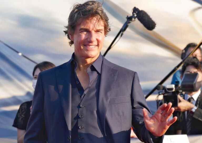 U.S. actor Tom Cruise waves his hand to fans at Japan premiere of 'Top Gun: Maverick' at Osanbashi Yokohama International Passenger Terminal in Kanagawa Prefecture on May 24. The movie, starring Tom Cruise  will be released from May 27th across Japan.  ( The Yomiuri Shimbun via AP Images )