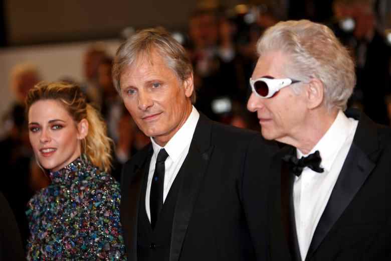 Kristen Stewart, from left, Viggo Mortensen, and director David Cronenberg pose for photographers upon arrival at the premiere of the film 'Crimes of the Future' at the 75th international film festival, Cannes, southern France, Monday, May 23, 2022. (Photo by Vianney Le Caer/Invision/AP)