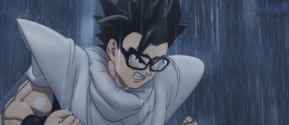 Goku, fou et grondant sous la pluie et portant de grosses lunettes épaisses pour une raison quelconque ?  dans Dragon Ball Super : Super Héros