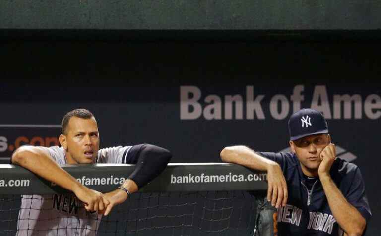 New York Yankees' Alex Rodriguez, left, and Derek Jeter look on from the dugout during a baseball game against the Baltimore Orioles, Wednesday, Sept. 11, 2013, in Baltimore. (AP Photo/Patrick Semansky)