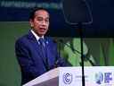 Le président indonésien Joko Widodo prend la parole lors d'une réunion lors de la Conférence des Nations Unies sur les changements climatiques (COP26) à Glasgow, Écosse, Grande-Bretagne, le 2 novembre 2021. 