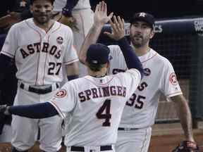 Justin Verlander (à droite) et George Springer des Astros ont remporté ensemble une Série mondiale en 2017.