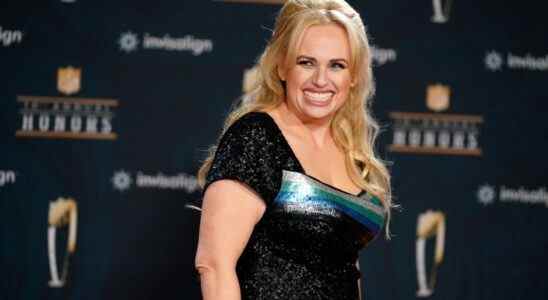 FILE - In this Tuesday, Feb. 2, 2021, file photo, Rebel Wilson poses on the red carpet during the NFL Honors football awards show, in Los Angeles. Wilson returns to her roots as host of ABC's “Pooch Perfect,” an eight-episode series featuring 10 dog groomers and their assistants competing in challenges. The show, which debuts March 30, is based on an Australian version. (AP Photo/Marcio Jose Sanchez, File)