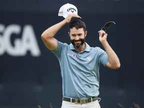 Le Canadien Adam Hadwin réagit sur le neuvième vert lors de la première ronde du 122e US Open Championship.