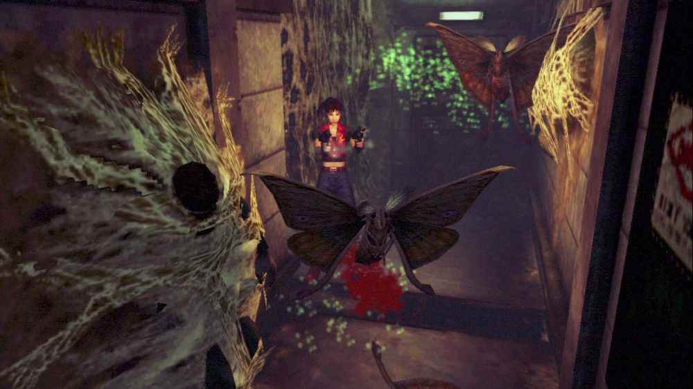 Claire Redfield tire sur des papillons de nuit mutants dans une capture d'écran de Resident Evil : Code Veronica X HD.