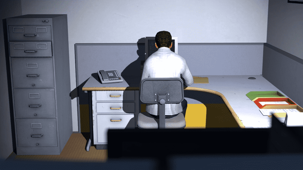 Stanley sits at his computer in the game