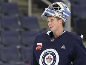 Eric Comrie est photographié à l'entraînement des Jets de Winnipeg le mercredi 23 mars 2022. KEVIN KING/Winnipeg Sun/Postmedia Network