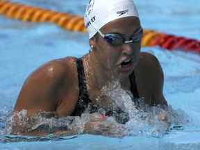 La Canadienne Mary-Sophie Harvey participe au 400 m QNI féminin lors des Jeux du Commonwealth de 2018 au Centre aquatique de la Gold Coast, le jeudi 5 avril 2018.