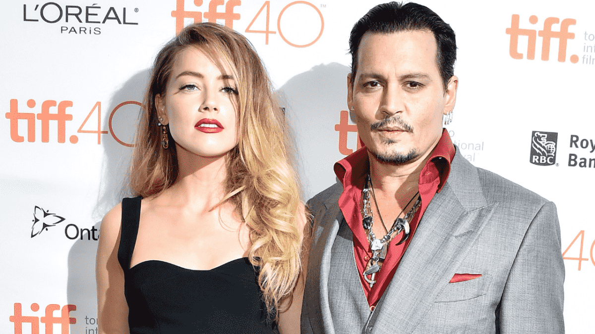 Amber Heard and Johnny Depp attend Black Mass Premiere